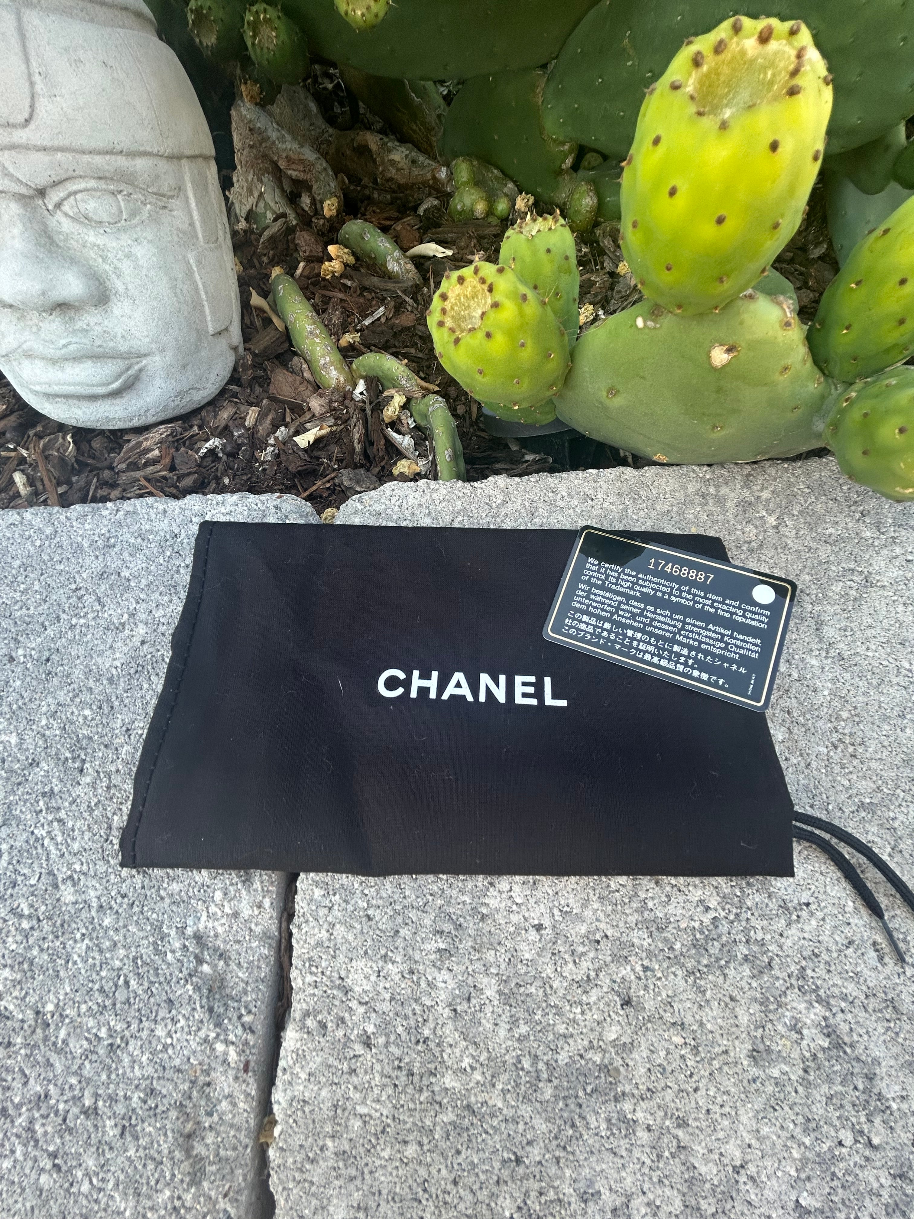 Chanel Lambskin Camellia WOC Black